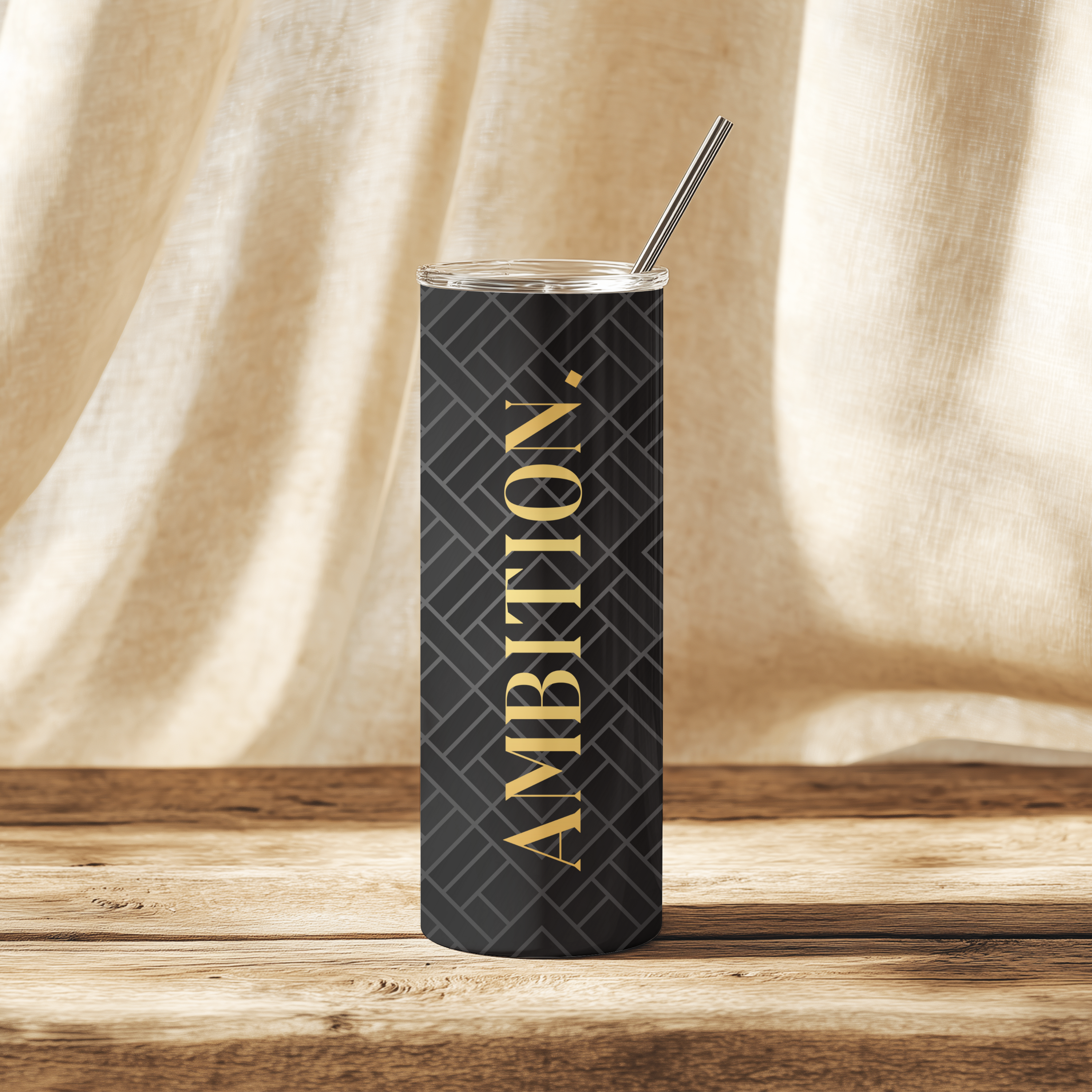 Front view of Ambition Drive™ tumbler with bold gold typography “Ambition.”