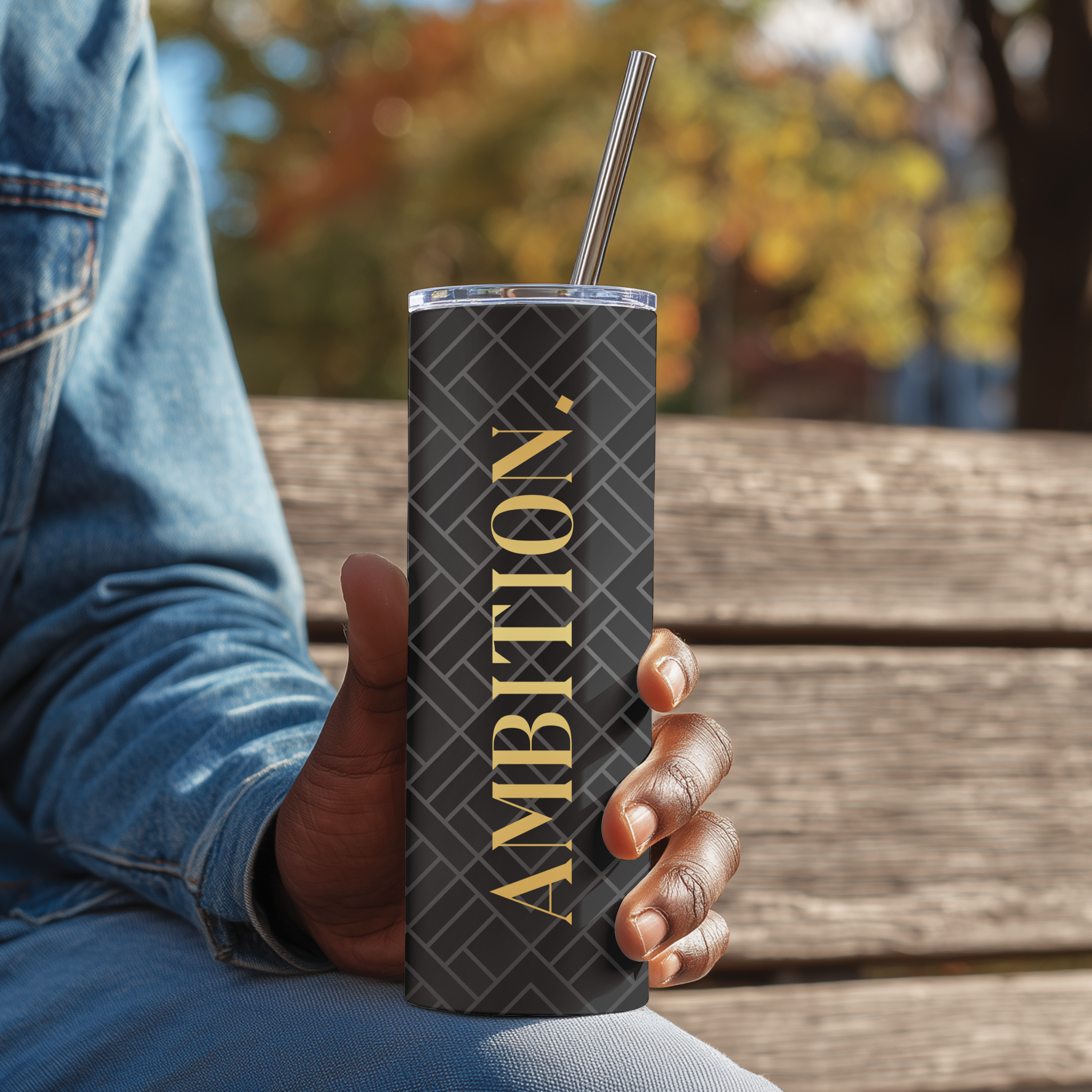 Side angle of tumbler design on black background.