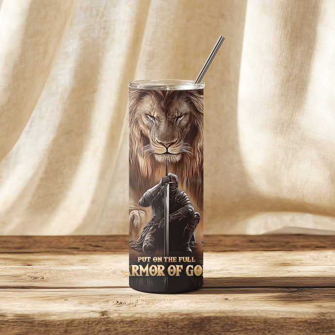 Front view of Armor of God™ Tumbler featuring lion and warrior design with spiritual armor symbols.