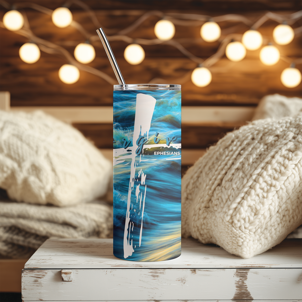 Forgiven tumbler with scripture design, 20oz stainless steel Christian drinkware on wooden table