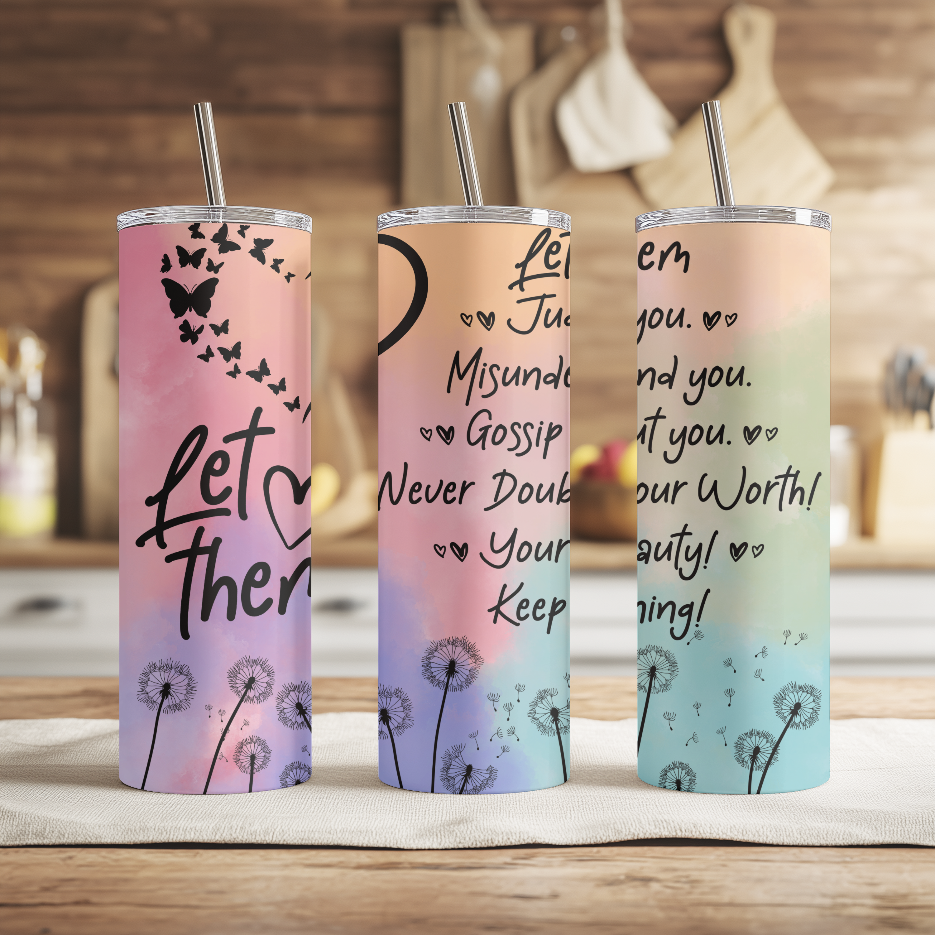 Close-up of tumbler with affirmation text: “Let them judge you, misunderstand you, gossip about you.”
