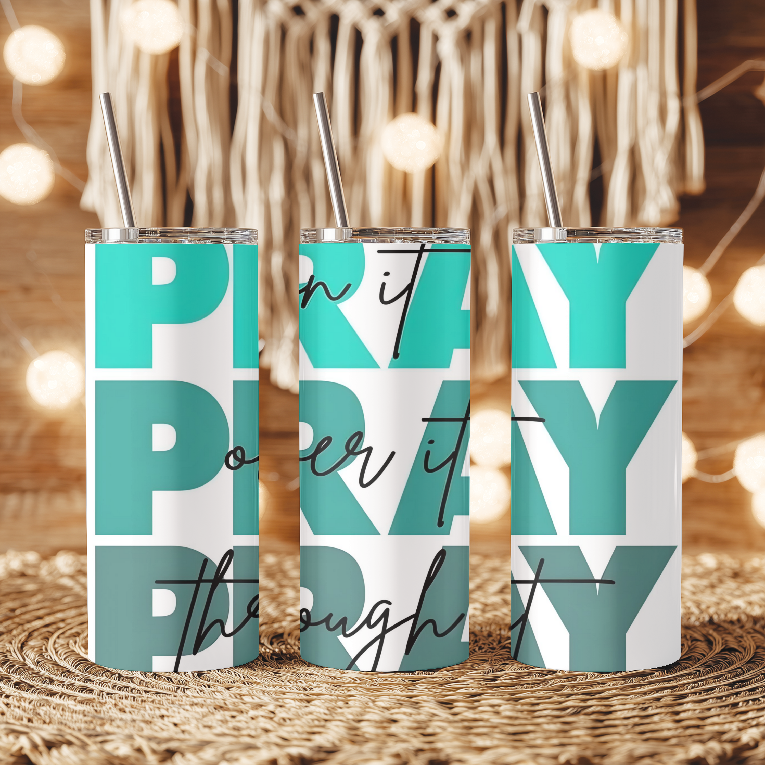 Close-up view of Pray On It, Over It, Through It™ tumbler highlighting bold lettering and stainless steel detail.