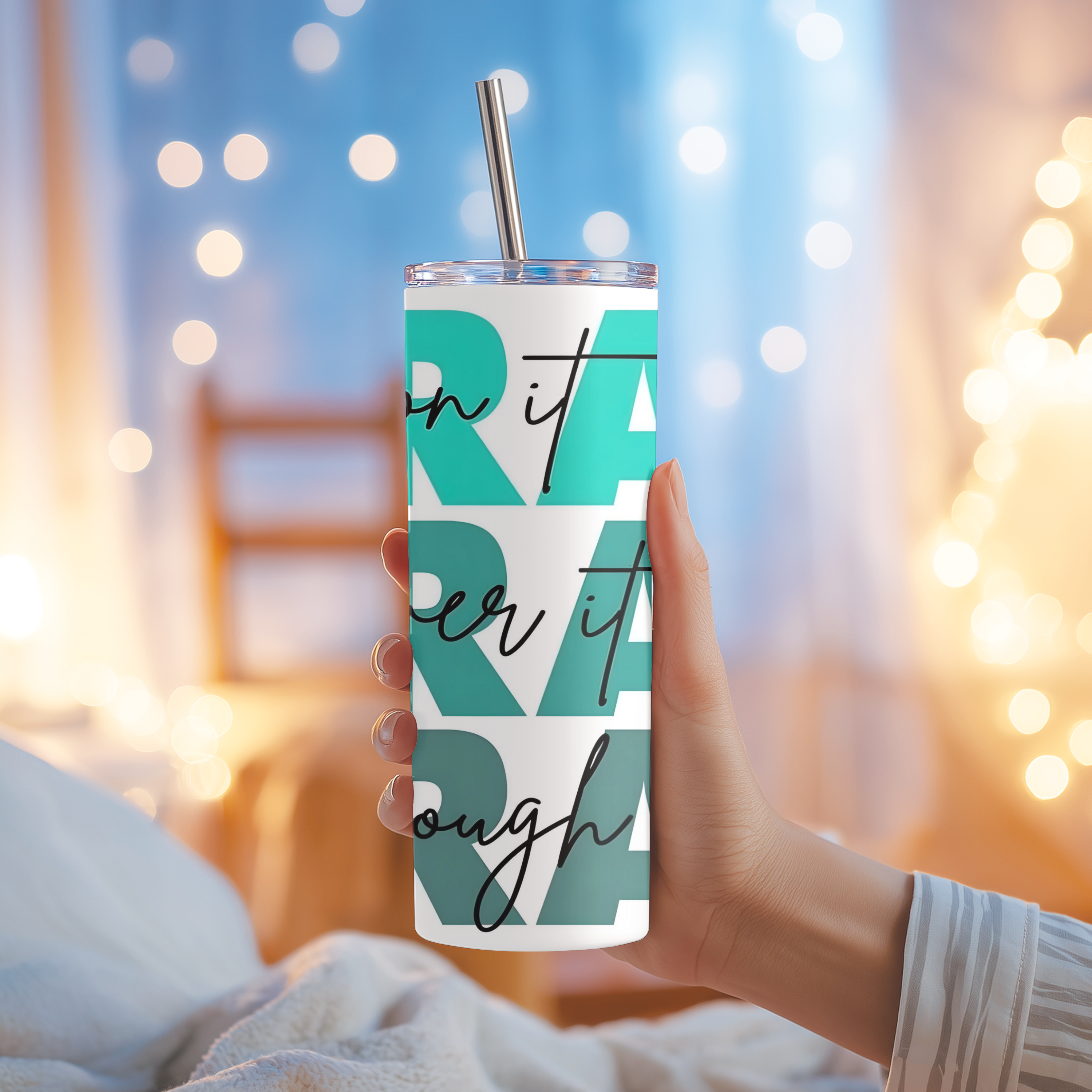 Side angle of Pray On It, Over It, Through It™ tumbler showing stacked typography design with modern script accents.
