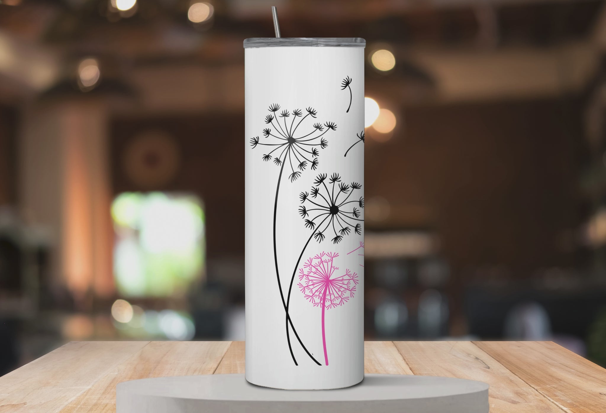 360° rotating mockup of Let Go™ tumbler with dandelion artwork.