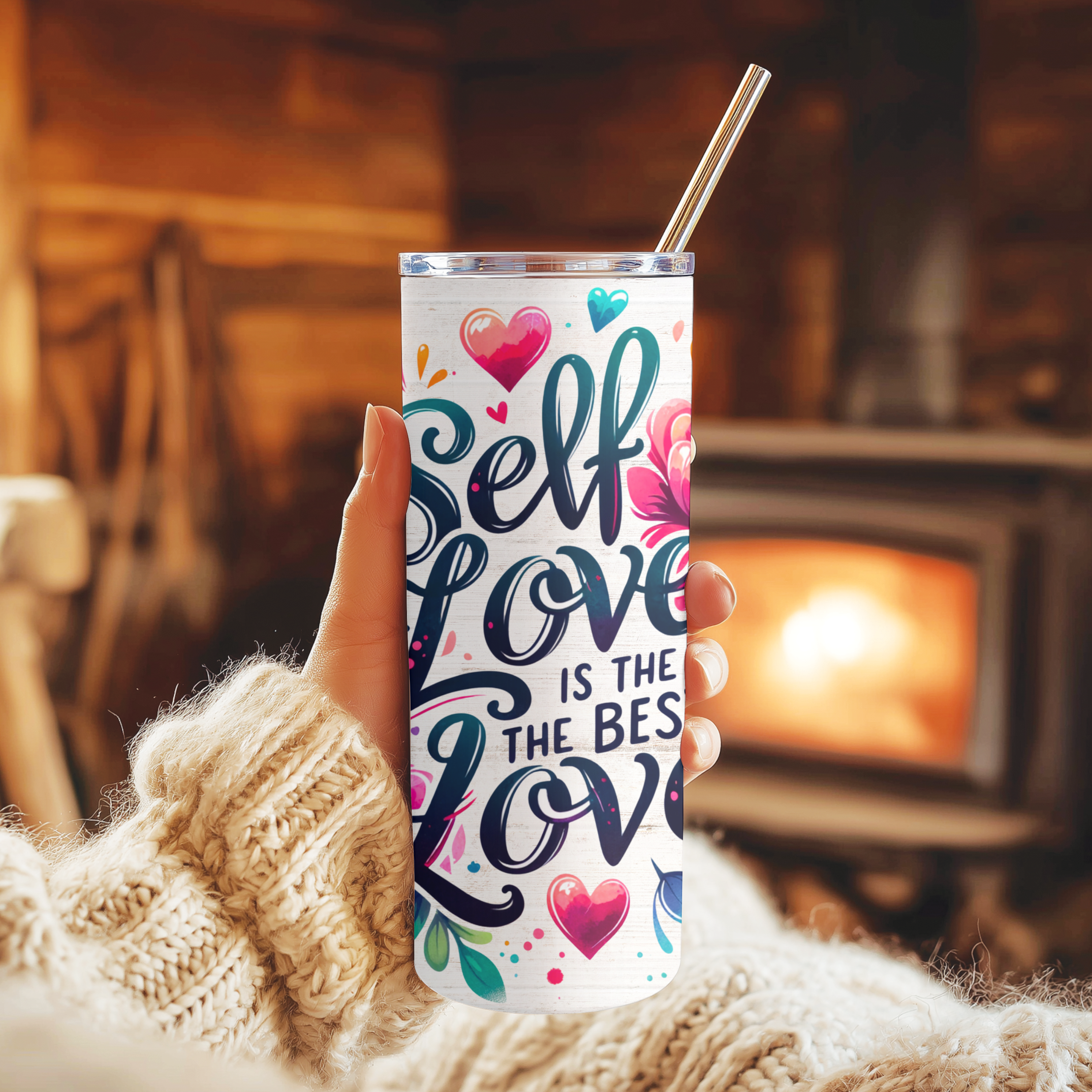 Side angle showing floral typography design on Self Love tumbler.