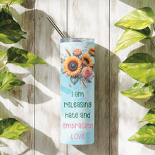 Load image into Gallery viewer, Lifestyle photo of Sunflower Strength™ tumbler in a bright, uplifting setting.
